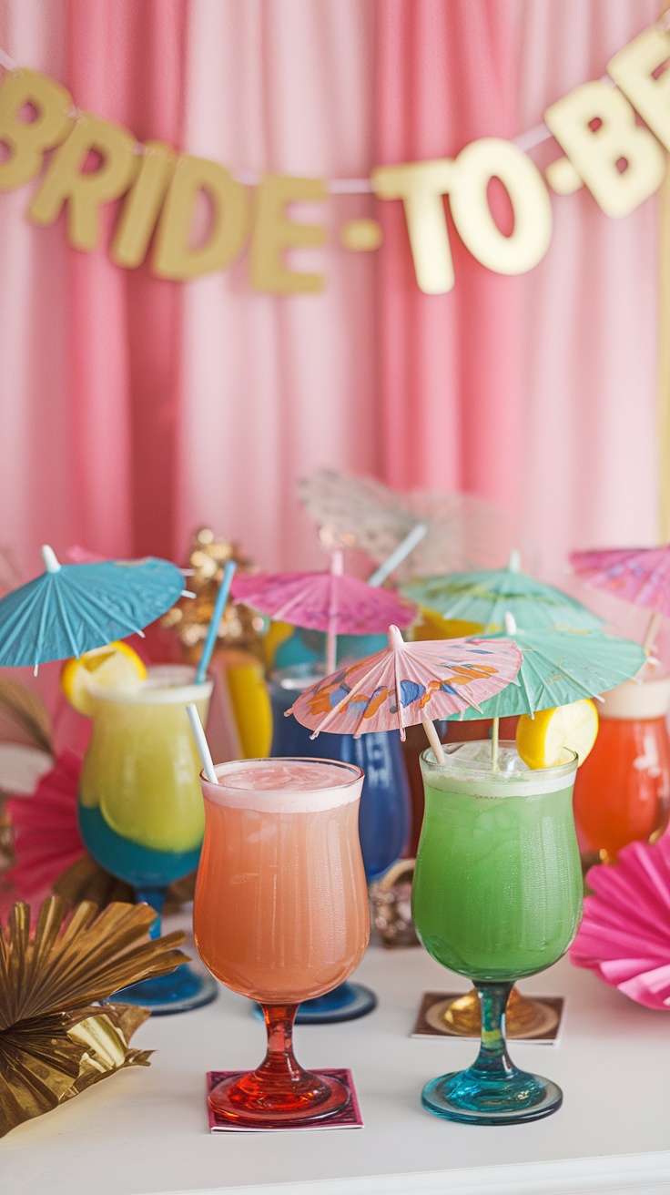 Colorful cocktails with umbrellas on a table decorated for a bridal shower