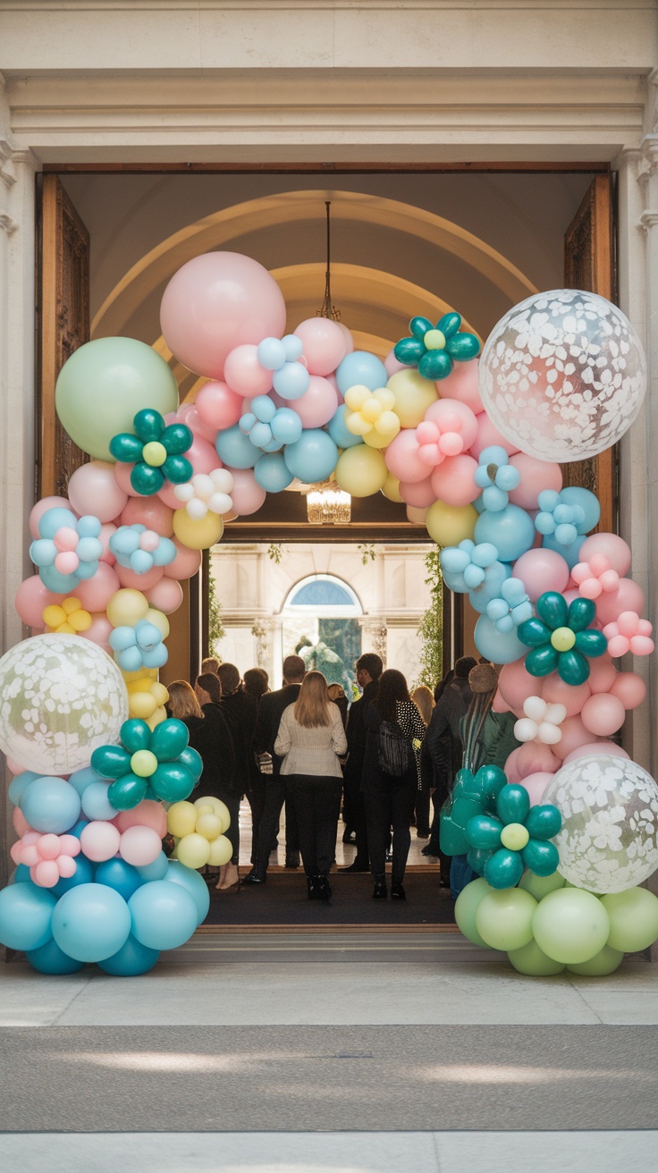 Colorful balloon archway decorated with flowers and various balloon sizes.